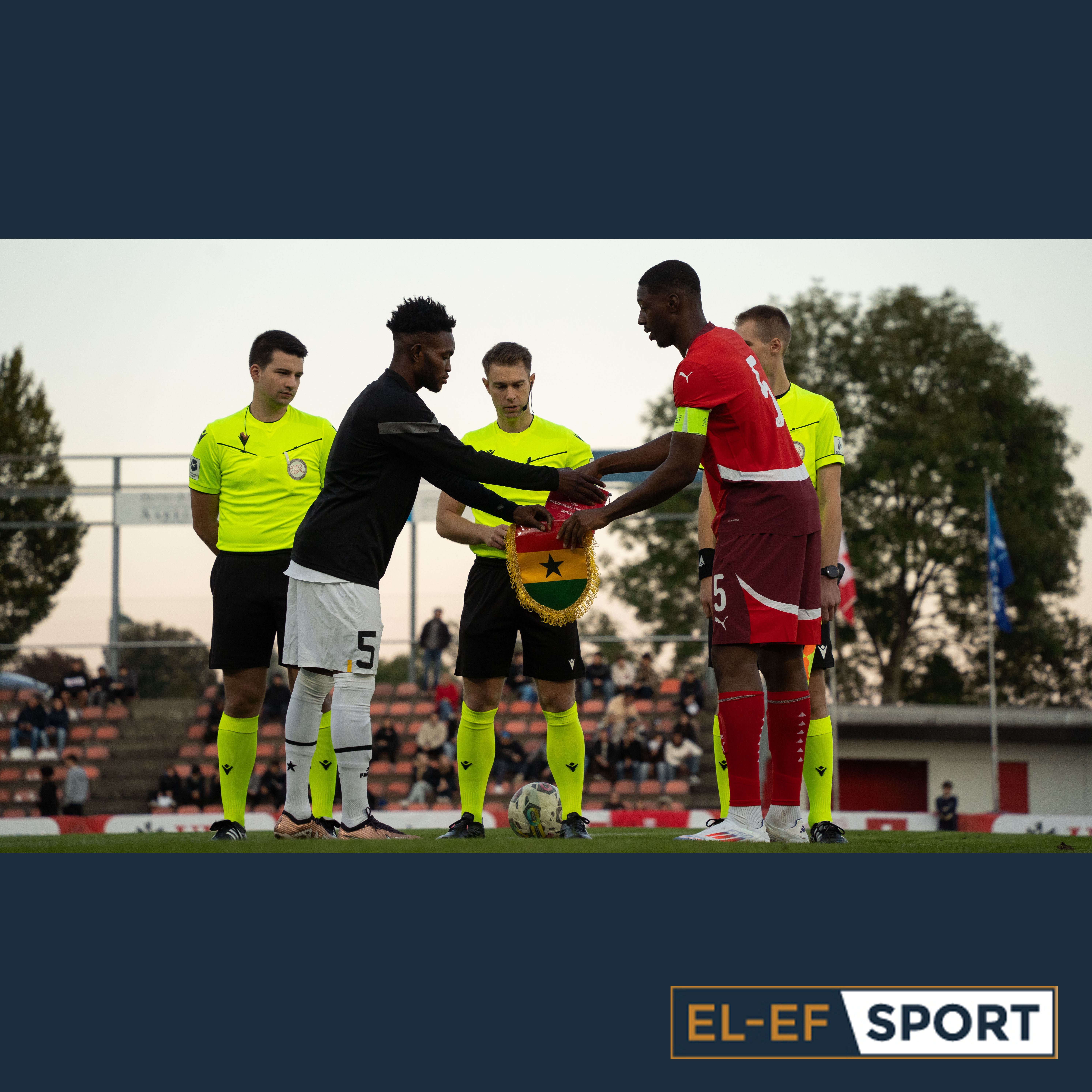 Captains of Switzerland U20 and Ghana U20 teams exchange pennants before their international friendly at Stadion Solothurn.